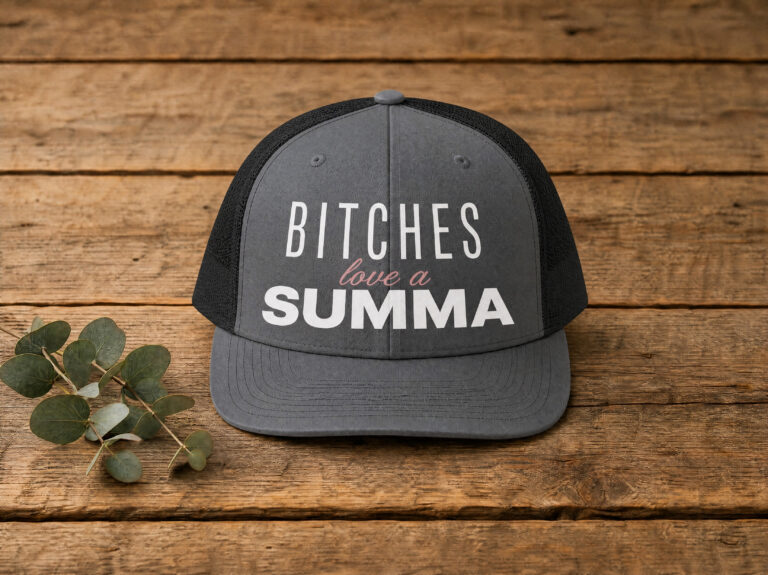 Charcoal and black trucker hat with humorous text