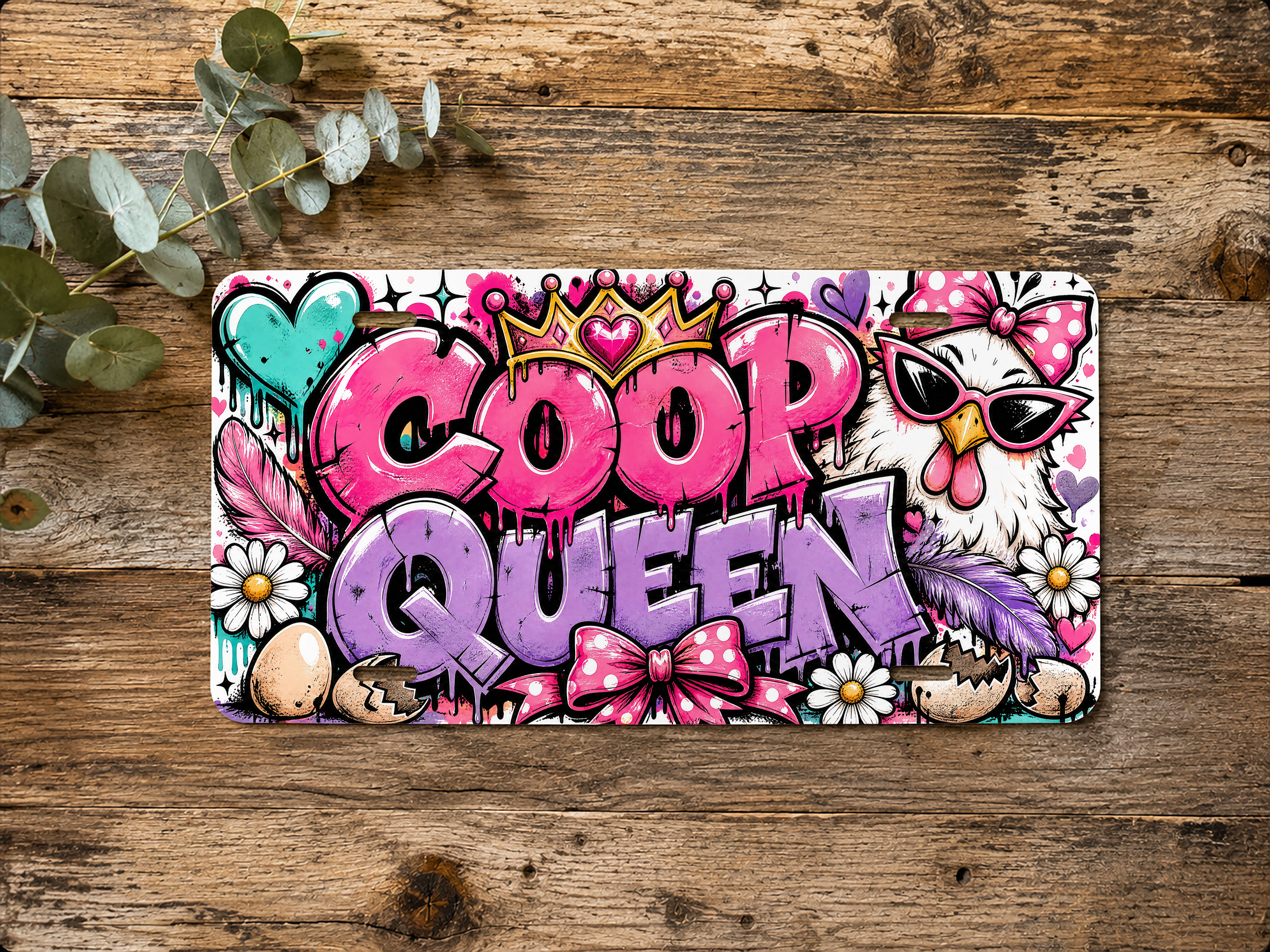 Horizontal coop queen vanity plate featuring a sunglasses-wearing chicken with a bow and bold chicken-themed artwork.