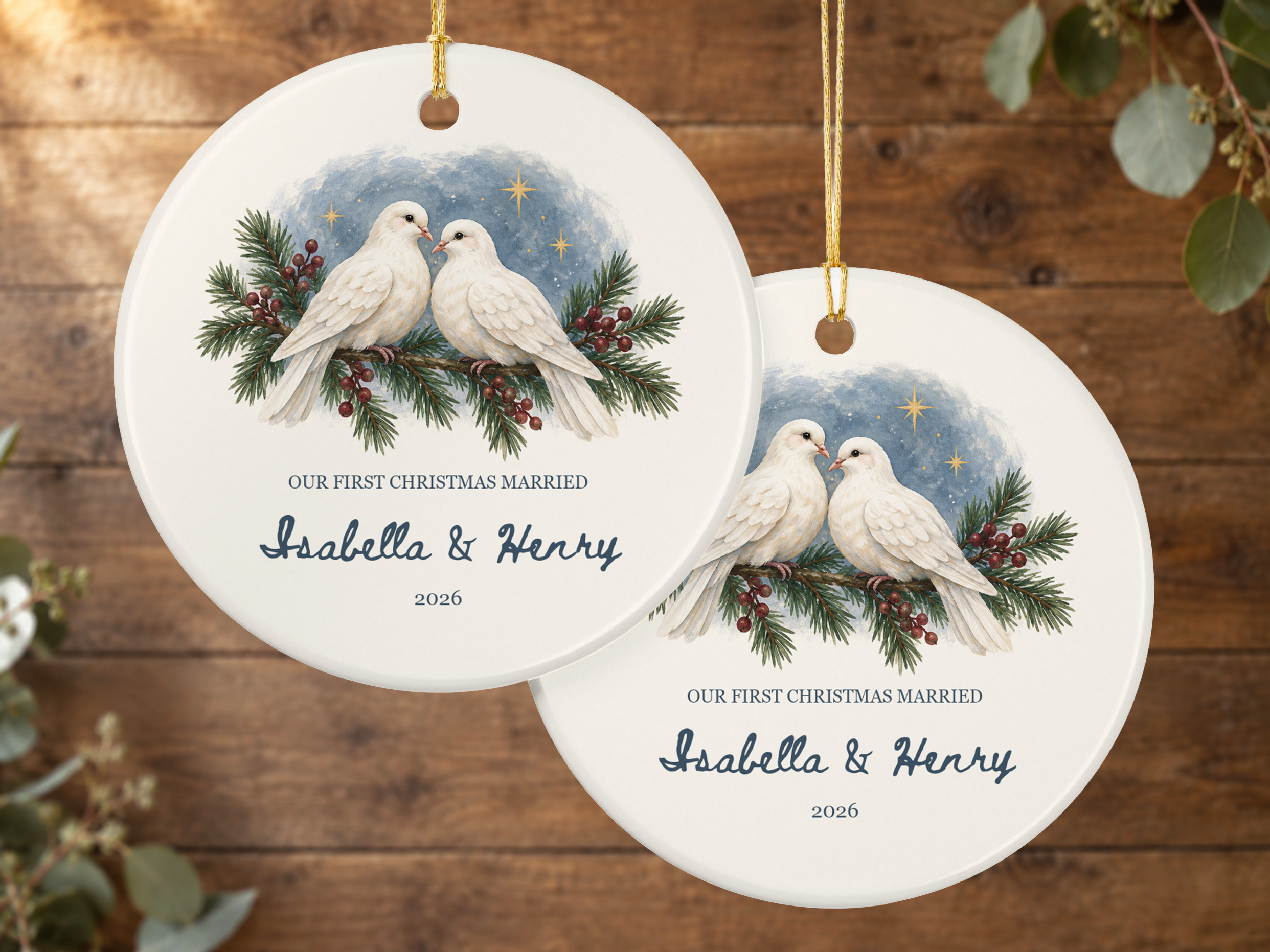 Personalized married Christmas ornament with two white doves, evergreen branches, red berries, names, and a four-digit year