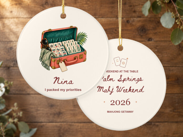 mahjong getaway ornament with illustrated suitcase, mahjong tiles, and coordinating double-sided artwork