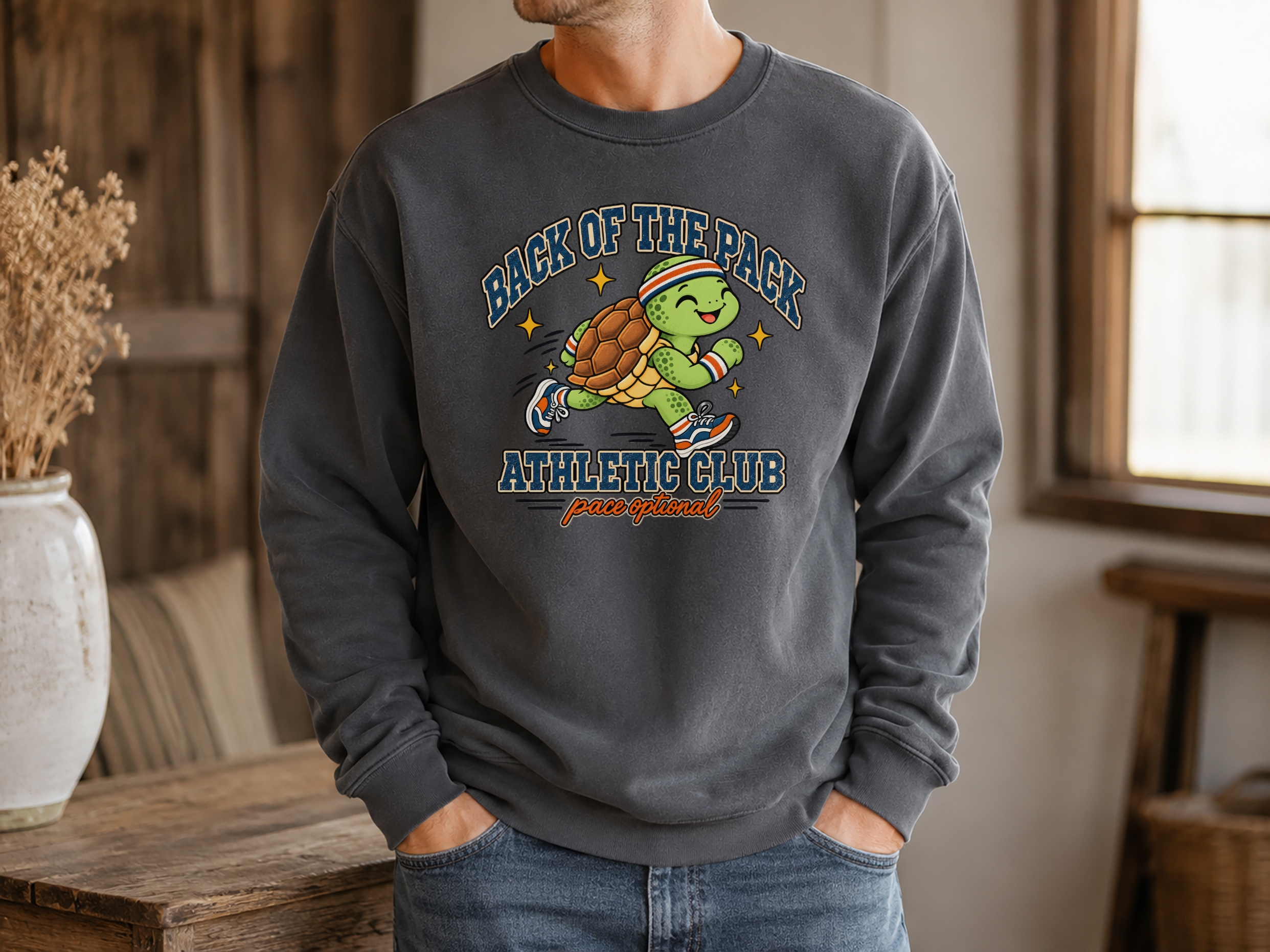Back of the pack turtle crewneck featuring a running turtle in a retro athletic-club graphic with pace optional wording.