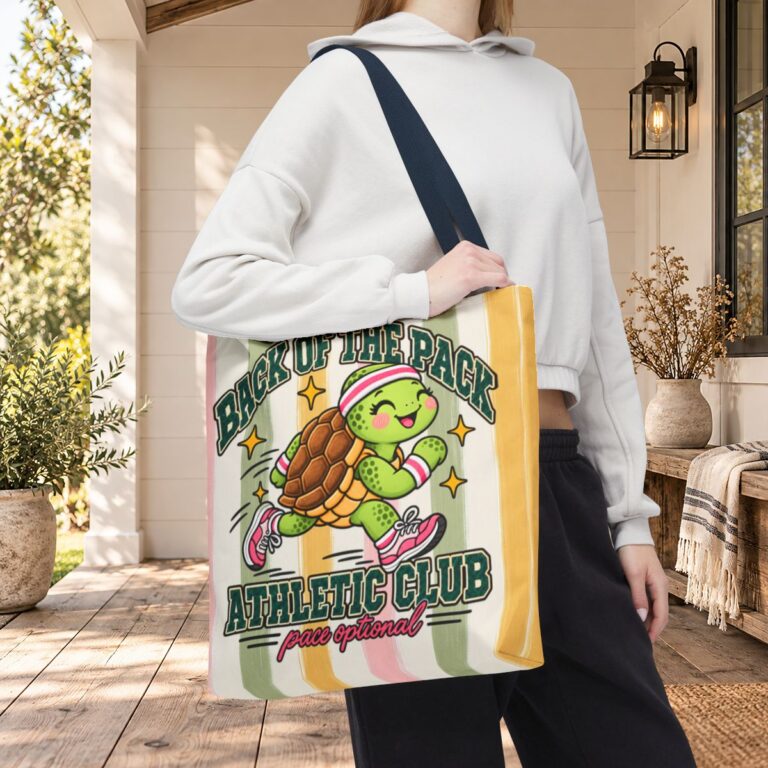 Turtle race day tote bag featuring a running turtle in pink sneakers with a playful athletic-club message
