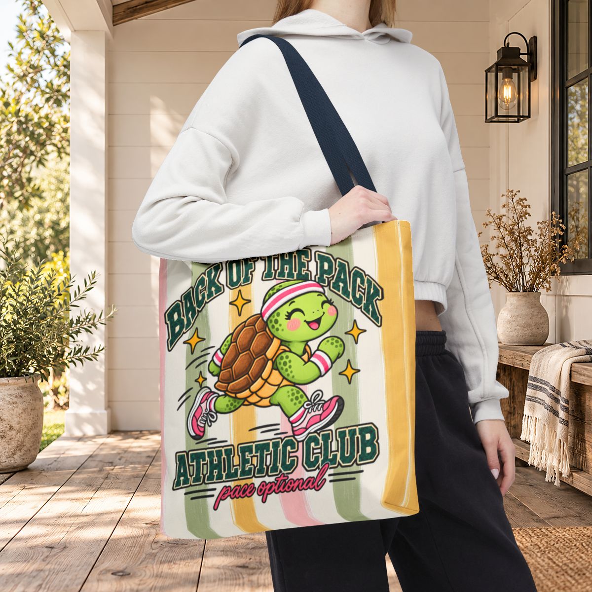 Turtle race day tote bag featuring a running turtle in pink sneakers with a playful athletic-club message